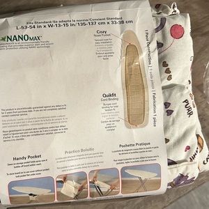 Quilted  ironing board.  New never use